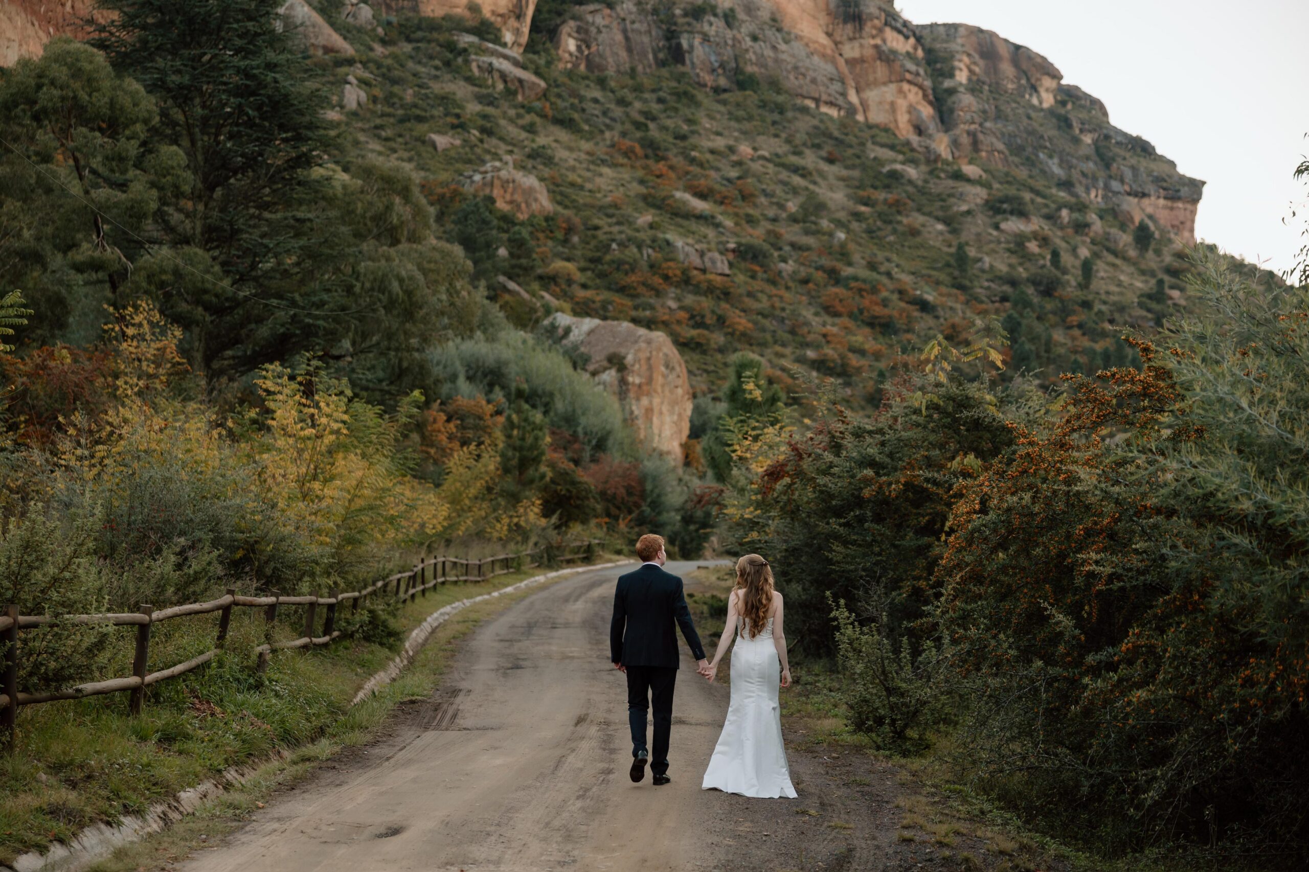 A wedding couple walking together at Wyndford